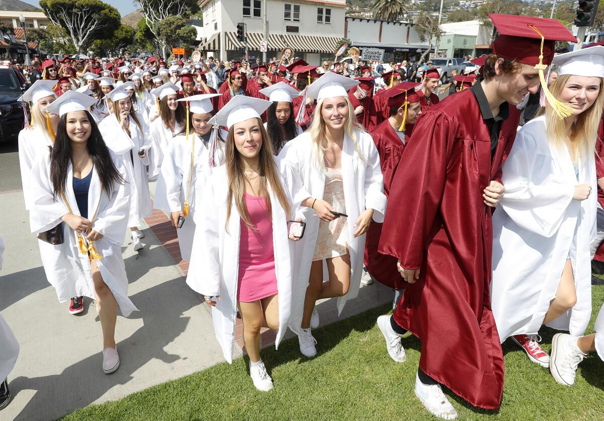 Seniors cross South Coast Highway and walk up to Main Beach.