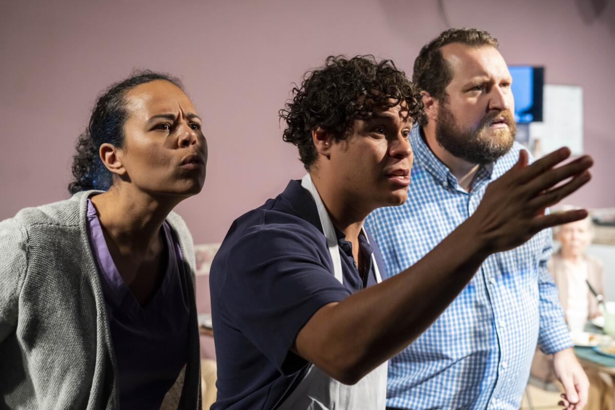 Nicki Barnes, left, Marcel Ferrin and Tom Steward in OnStage Playhouse's "Rest."