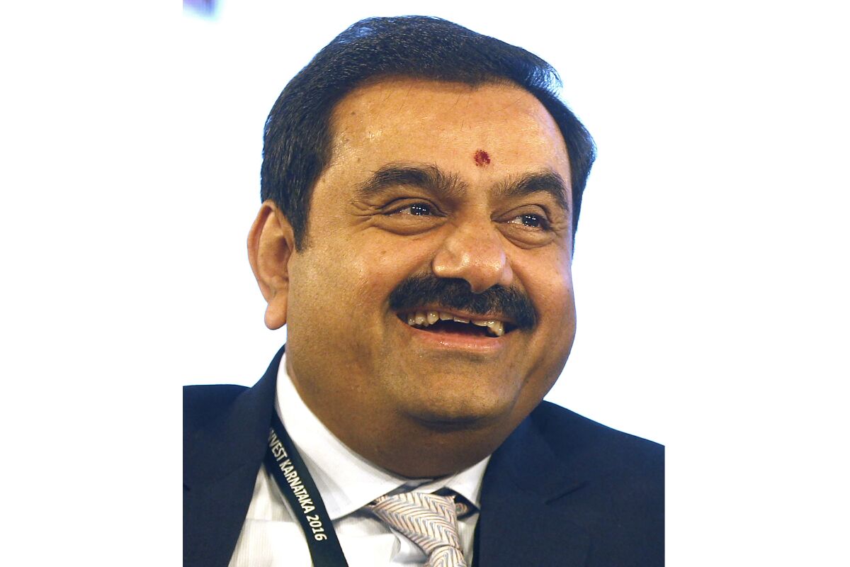 FILE- Adani Group Chairman Gautam Adani attends the 'Invest Karnataka 2016 - Global Investors Meet' in Bangalore, India, Feb. 3, 2016. India's Adani Group launched a share offering for retail investors Friday, Jan. 27, 2023, as it mulled taking legal action against U.S.-based short-selling firm Hindenburg Research for allegations of stock market manipulation and accounting fraud that caused heavy selling of its stocks this week. (AP Photo/Aijaz Rahi, File)