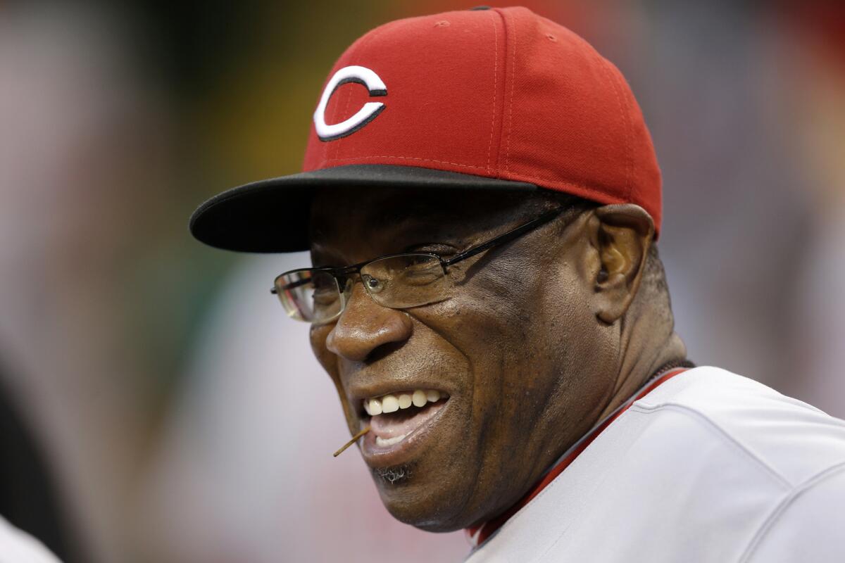 Dusty Baker, shown here managing the Cincinnati Reds in 2013, will manage the Washington Nationals in 2016.