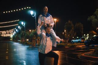 Michelle Yeoh and Harry Shum, Jr. in "Everything Everywhere All At Once" Photo credit: Allyson Riggs / A24