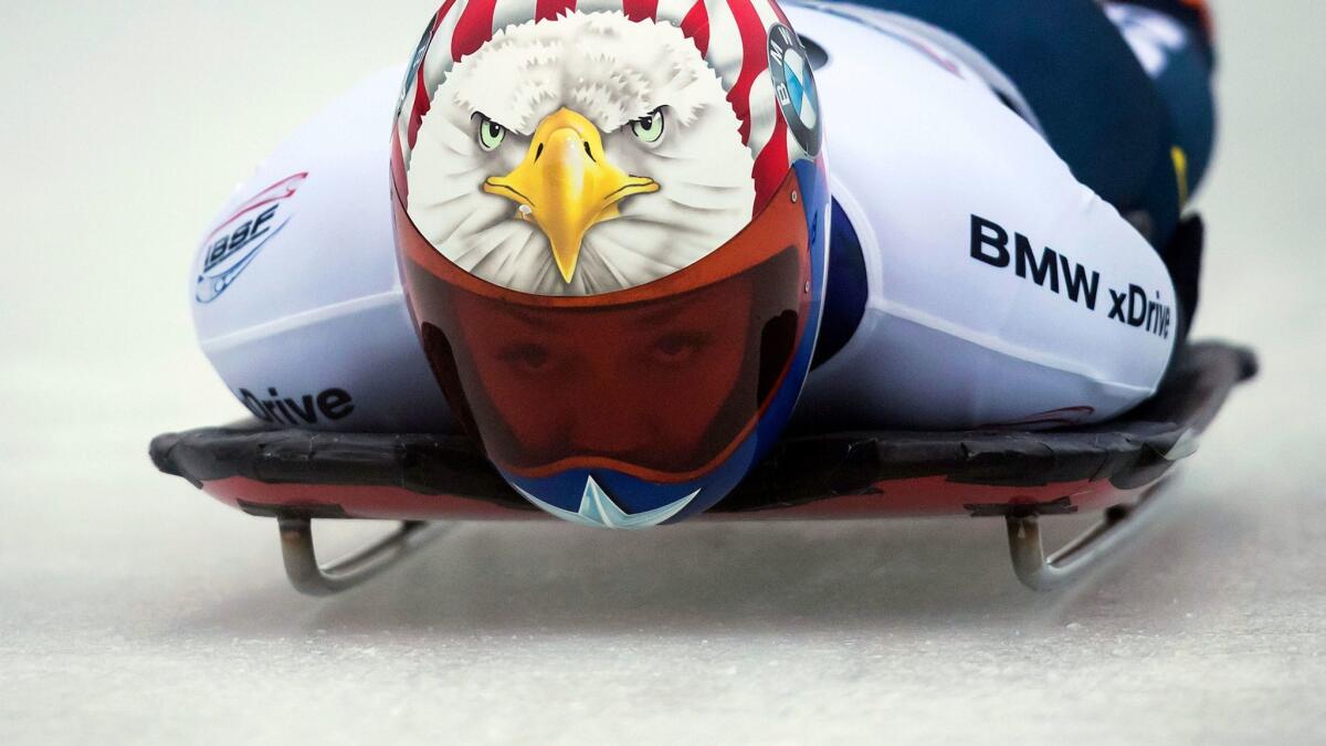U.S. skeleton racer Katie Uhlaender was separated from a bronze medal at the Sochi Games by four-hundredths of a second, and international politics.