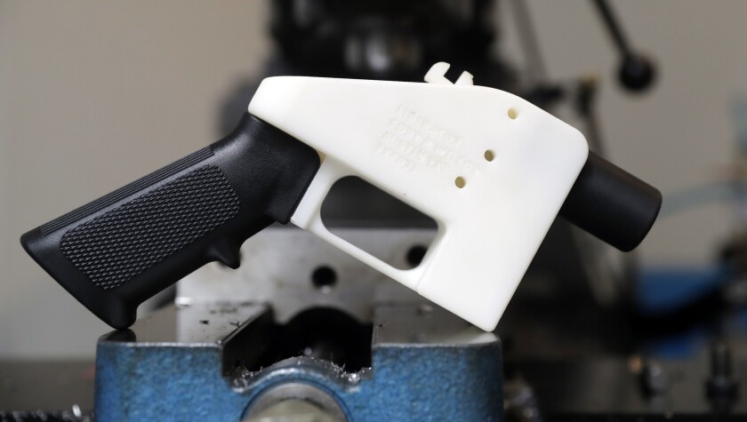A 3-D-printed gun called the Liberator is shown at Defense Distributed in Austin, Texas. A federal judge in Seattle has issued a temporary restraining order to stop the release of blueprints to make 3-D-printed guns.