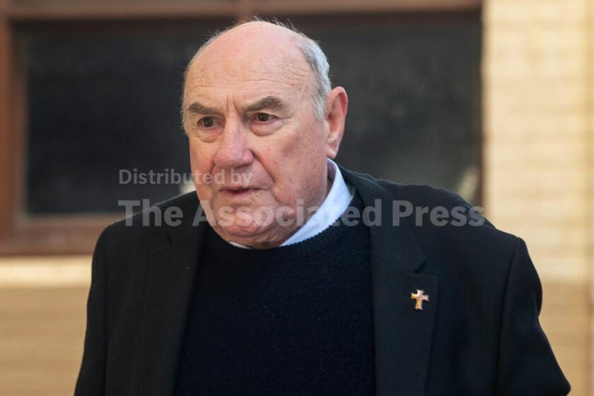 Former Bishop of Broome Christopher Alan Saunders arrives at the West Australian District Court in Perth, Australia, on Aug. 11, 2026. (Aaron Bunch/AAP Image via AP)