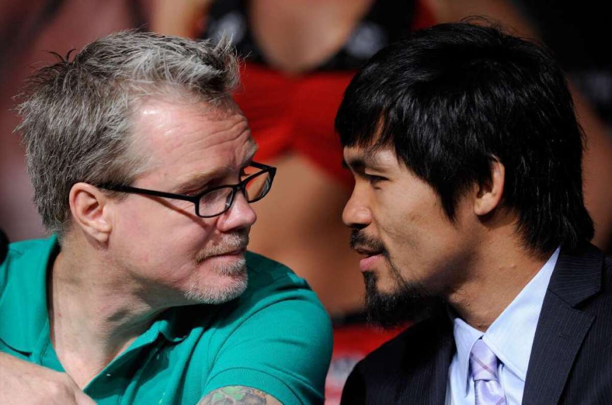 Boxing trainer Freddie Roach and Manny Pacquiao.