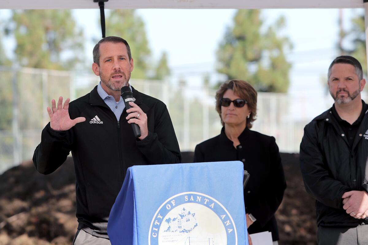 A groundbreaking ceremony on a new miniature outdoor hard-surface soccer field in Santa Ana.