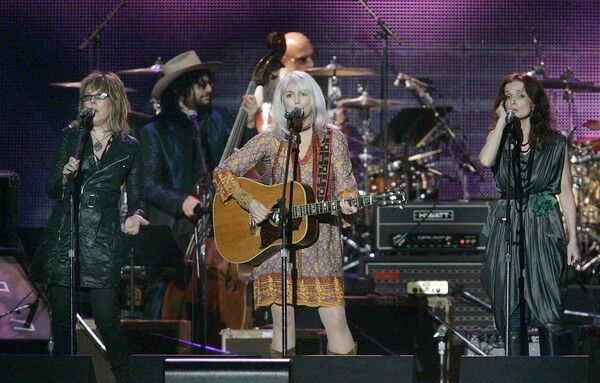 Lucinda Williams, left, Emmylou Harris and Patty Griffin
