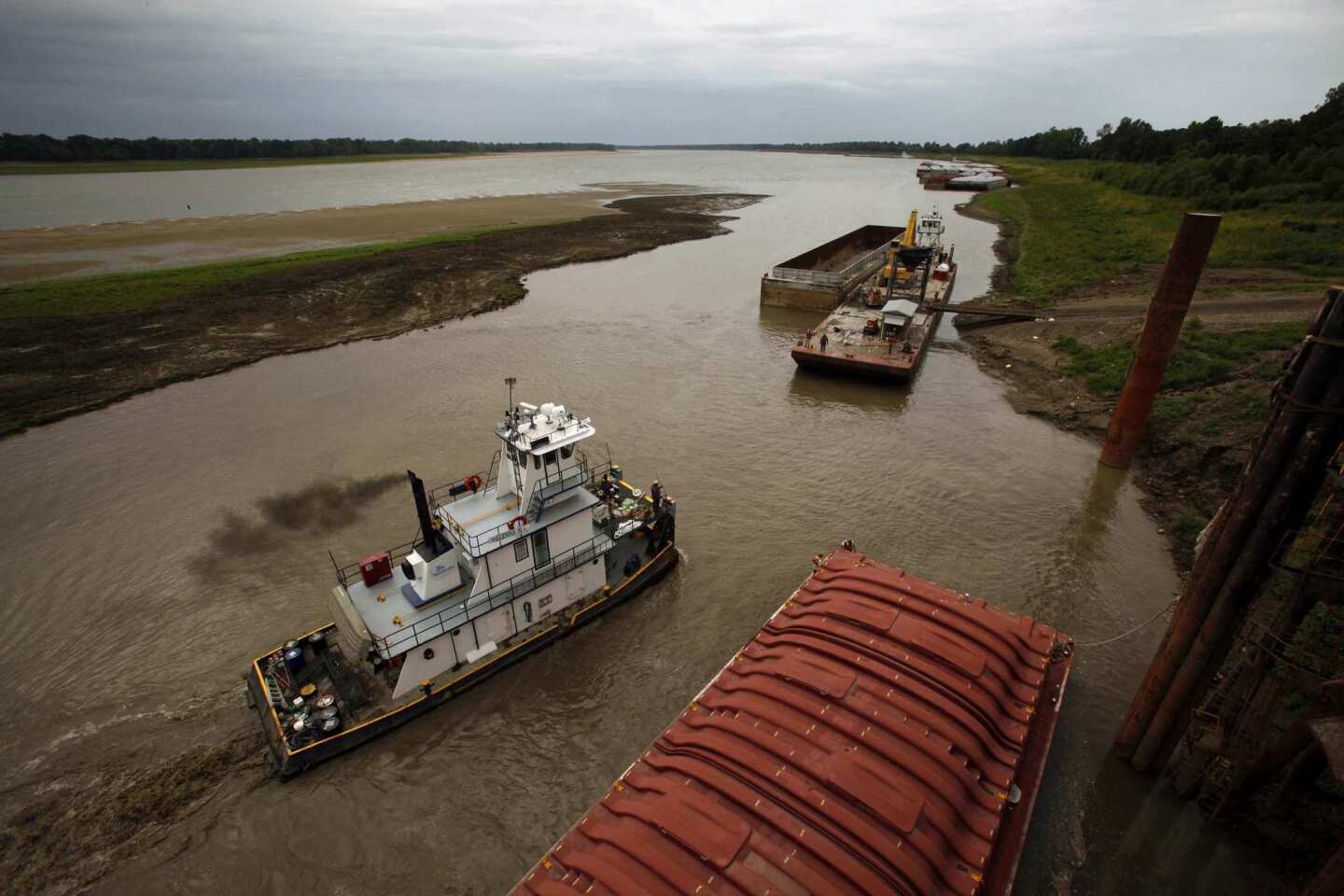 A sandbar no one has seen before appears in the Mississippi River at Lake Providence, La. Farmers are desperate to get their corn and soybeans shipped.