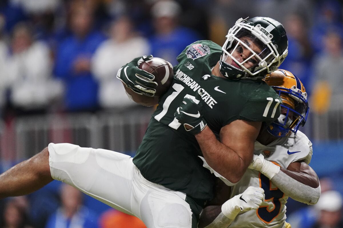 Michigan State tight end Connor Heyward makes a touchdown catch against Pittsburgh defensive back Brandon Hill.