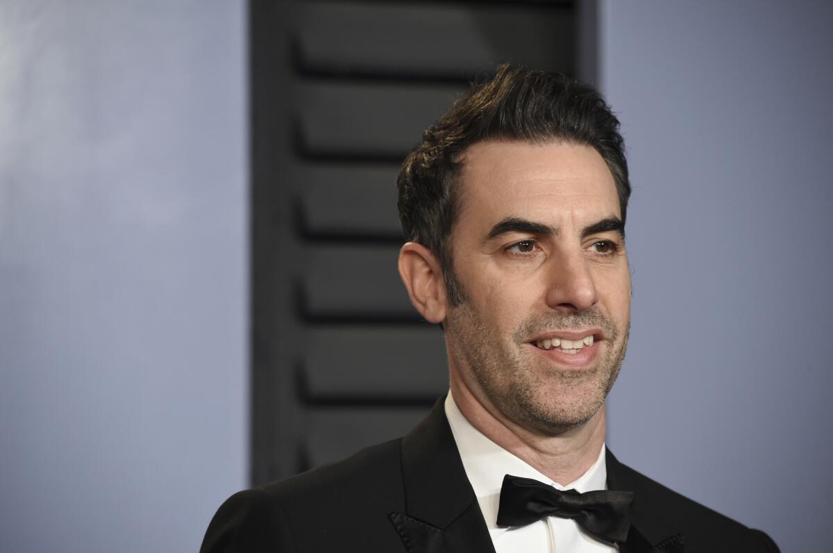 FILE - In this March 4, 2018, file photo, comedian Sacha Baron Cohen arrives at the Vanity Fair Oscar Party in Beverly Hills, Calif. On Thursday, July 7, 2022, Cohen defeated a $95 million defamation lawsuit by former Alabama Chief Justice Roy Moore, who said he was tricked into a humiliating television appearance that lampooned sexual misconduct accusations against him. (Photo by Evan Agostini/Invision/AP, File)