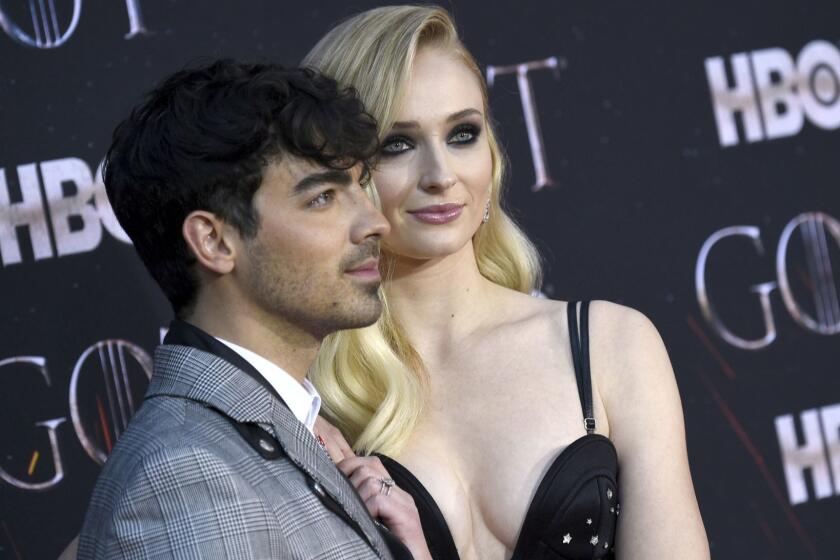 FILE - In this April 3, 2019 file photo, Joe Jonas, left, and Sophie Turner attend HBO's "Game of Thrones" final season premiere at Radio City Music Hall in New York. The couple have gotten married in a surprise ceremony in Las Vegas. It happened Wednesday night, May 1 after the Billboard Music Awards, where the Jonas Brothers had performed. Turner?s publicist confirmed the nuptials, which DJ Diplo posted on his Instagram live feed. (Photo by Evan Agostini/Invision/AP, File)