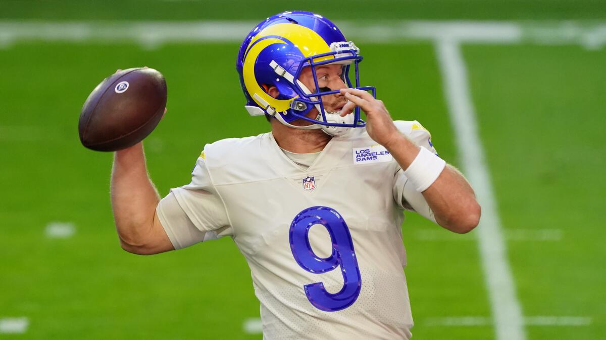 Rams quarterback John Wolford warms up before a game against the Arizona Cardinals on Dec. 6.