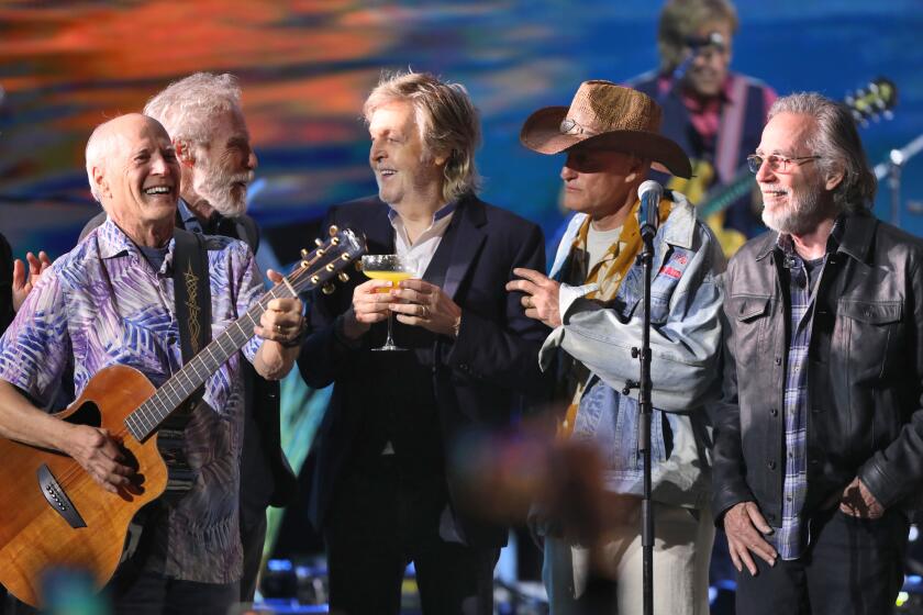 Paul McCartney and Woody Harrelson and members of the Coral Reefer Band pay tribute to Jimmy Buffett at the Hollywood Bowl