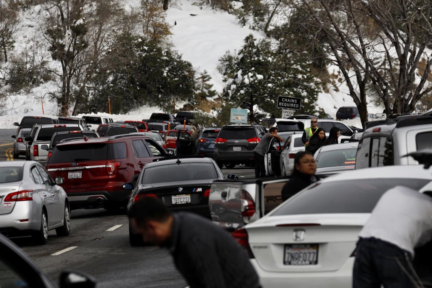 Gridlock on route 330 towards Big Bear as drivers pull over to put on chains at the CalTrans check point due to icy road conditions.
