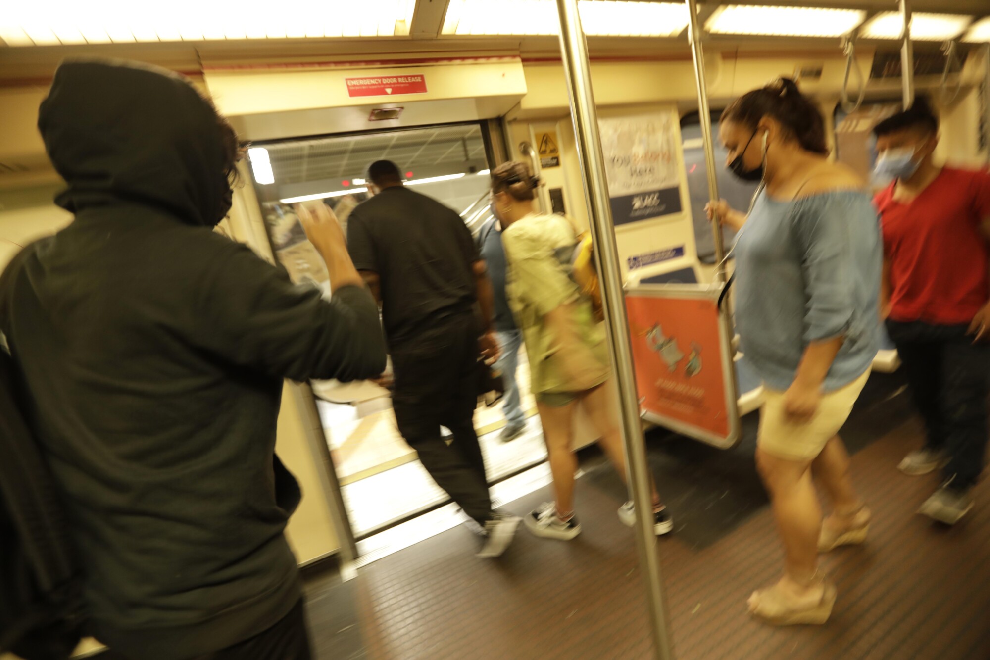 Commuters arrive at the North Hollywood Metro station on the Red Line in North Hollywood.