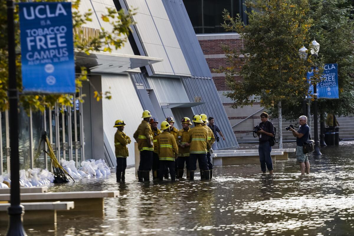 -Scenes from around the campus of UCLA after a water main broke under Sunset Boulevard, flooding the street and onto the Westwood campus.