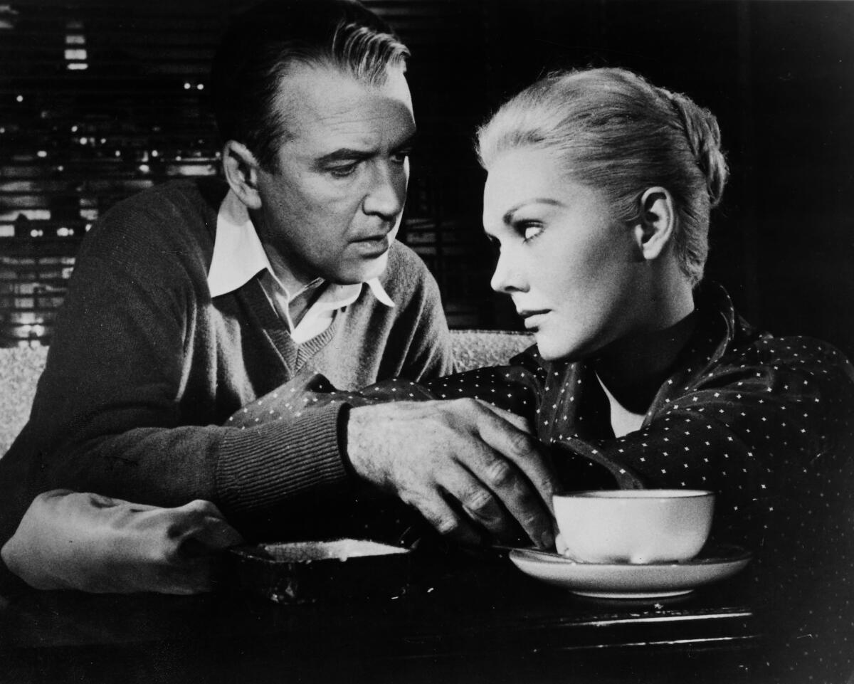 James Stewart and Kim Novak in the Alfred Hitchcock thriller 'Vertigo', 1958.
