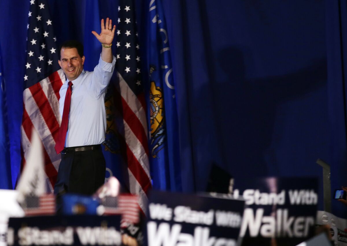 Gov. Scott Walker waves at his victory party in 2012.