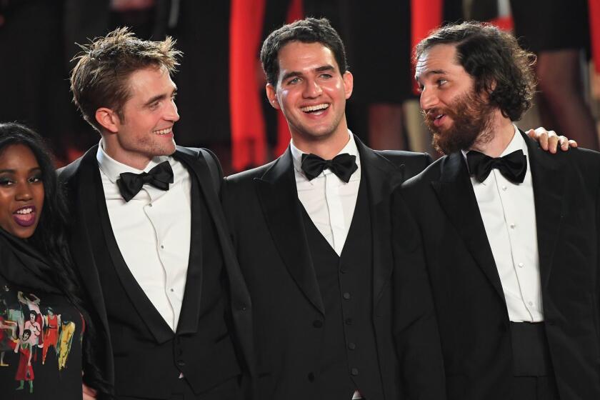 (FromL) US actress Taliah Webster, British actor Robert Pattinson, US director Benny Safdie and US director Josh Safdie pose as they arrive on May 25, 2017 for the screening of the film 'Good Time' at the 70th edition of the Cannes Film Festival in Cannes, southern France. / AFP PHOTO / Anne-Christine POUJOULATANNE-CHRISTINE POUJOULAT/AFP/Getty Images ** OUTS - ELSENT, FPG, CM - OUTS * NM, PH, VA if sourced by CT, LA or MoD **