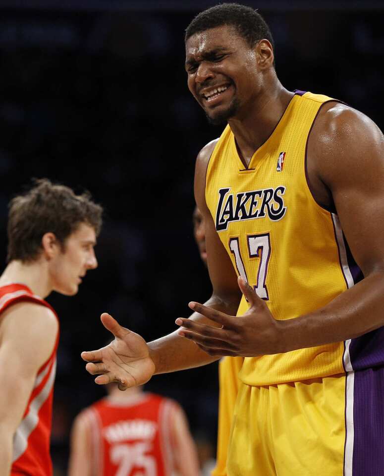 Lakers center Andrew Bynum, who was eventually ejected after picking up two technical fouls in the second half, pleads his case with a referee during the game against the Rockets on Friday night at Staples Center.