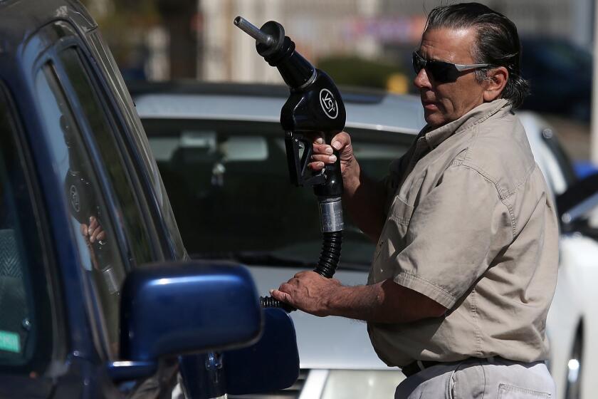 MILL VALLEY, CA - MARCH 03: A customer prepares to pump gasoline into his car at an Arco gas station on March 3, 2015 in Mill Valley, California. U.S. gas prices have surged an average of 39 cents in the past 35 days as a result of the price of crude oil prices increases, scheduled seasonal refinery maintenance beginning and a labor dispute at a Tesoro refinery. It is predicted that the price of gas will continue to rise through March. (Photo by Justin Sullivan/Getty Images) ORG XMIT: 540950137