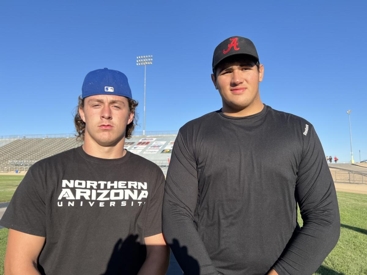 Linebacker Dustin Reynolds (left) and offensive tackle Raymond Pulido lead Apple Valley.