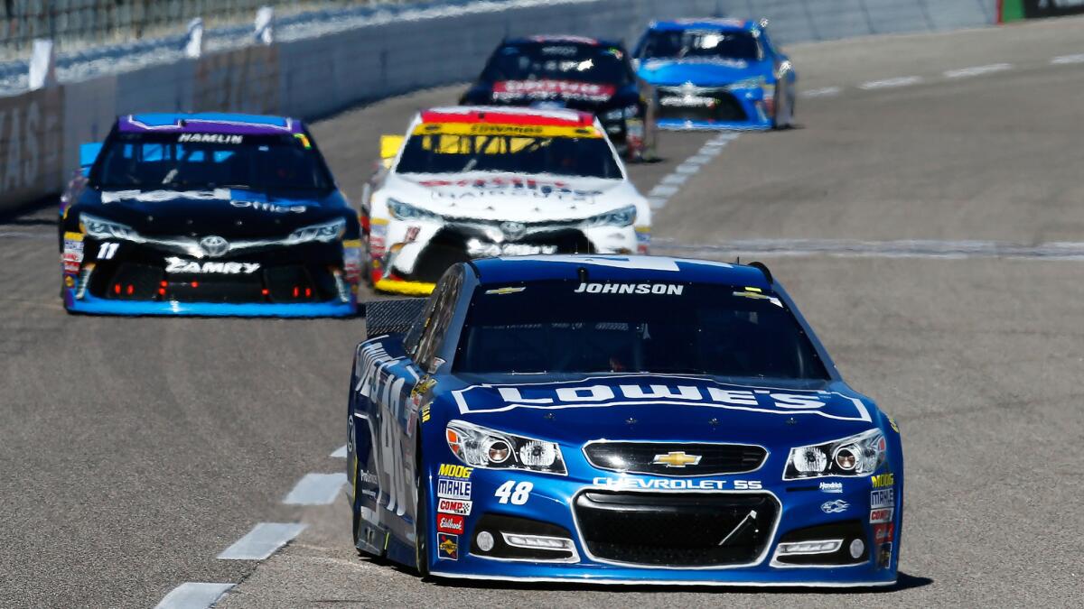 NASCAR driver Jimmie Johnson leads the pack during the Sprint Cup Series race Sunday at Texas Motor Speedway.