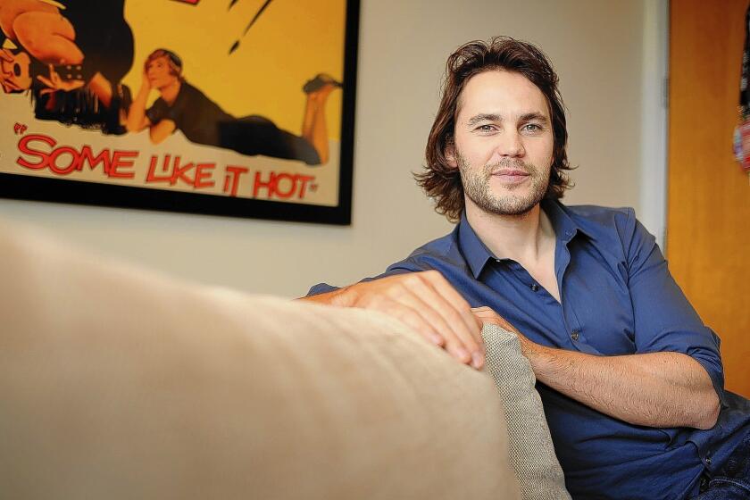 Actor Taylor Kitsch plays a young doctor recruited by a small coastal town in the movie "The Grand Seduction."