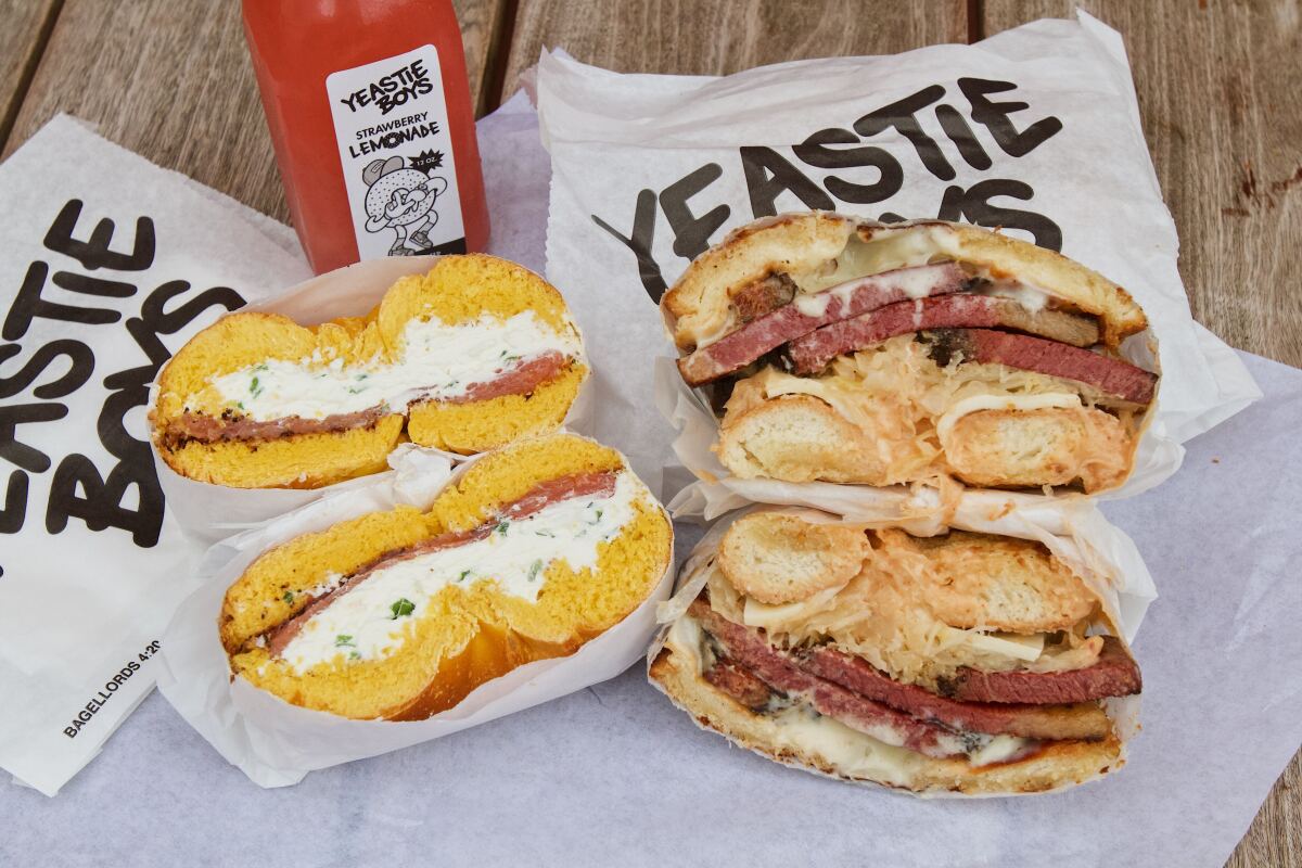 Bagels sliced in half with lox and cream cheese, left, and the makings of a Reuben sandwich.