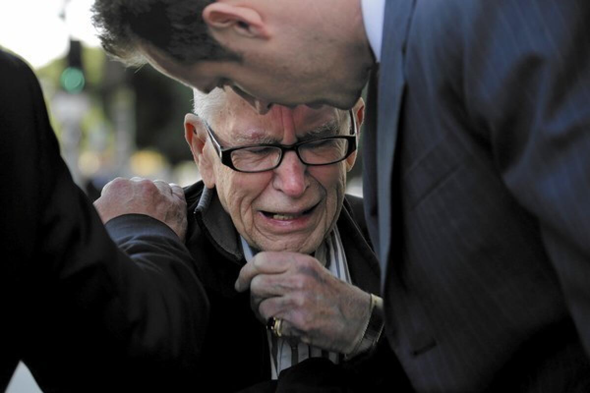 Bill Beaird, 80, father of Brian Beaird, who was shot to death in downtown L.A. by police Dec. 13, weeps at a news conference at LAPD headquarters Friday.