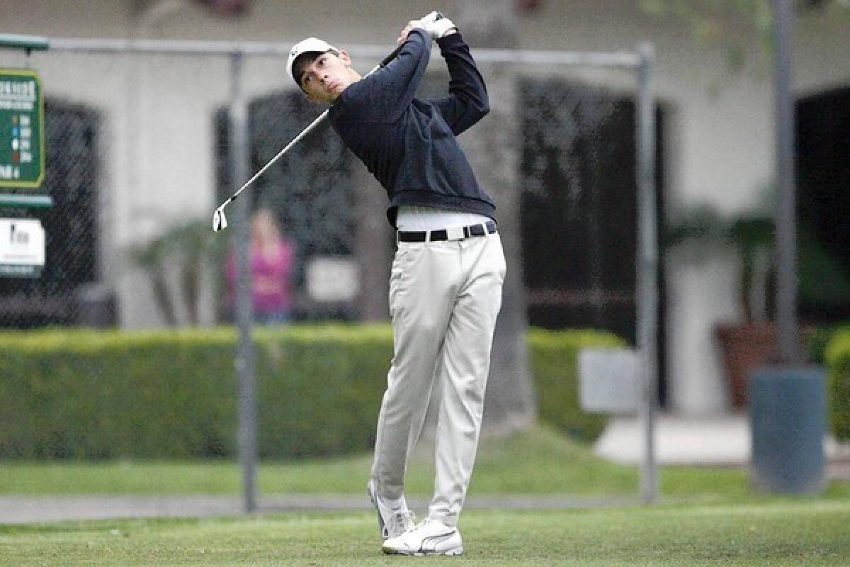 St. Francis' Vince De Pinto swings at the ball during a match, which took place at Brookside Golf Course in Pasadena on Wednesday, April 24, 2013.