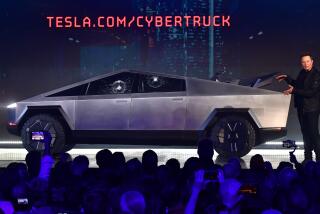 Tesla co-founder and CEO Elon Musk gestures while wrapping up his presentation of the newly unveiled all-electric battery-powered Tesla Cybertruck at Tesla Design Center in Hawthorne, California on November 21, 2019. (Photo by Frederic J. BROWN / AFP) (Photo by FREDERIC J. BROWN/AFP via Getty Images)