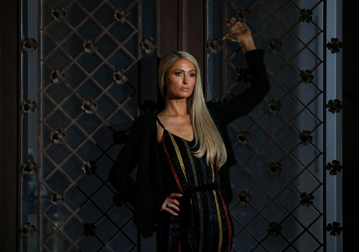 Paris Hilton strikes a dramatic post at home in Beverly Hills