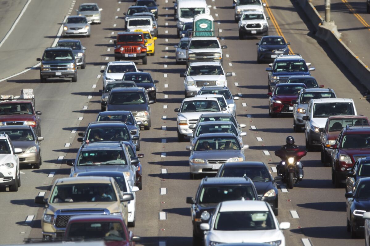 Cars fill several lanes of a highway in San Diego. 