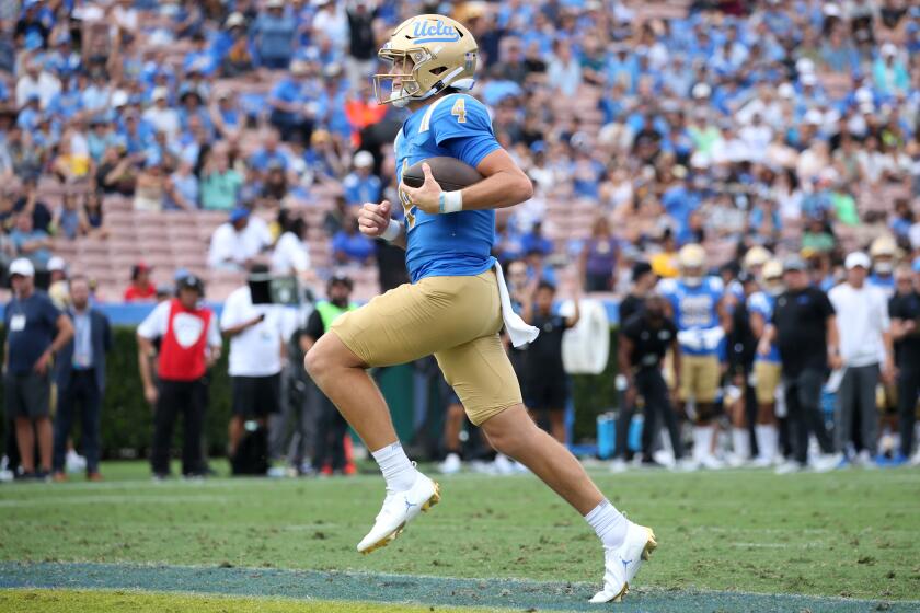 UCLA quarterback Ethan Garbers scores on a two-yard, second-quarter touchdown run against Alabama State on Sept. 10, 2022.