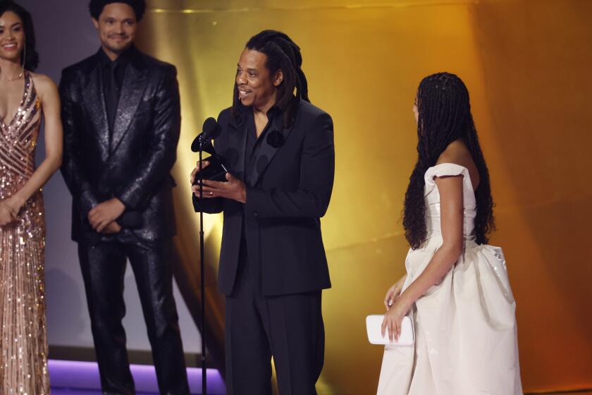 Los Angeles, CA - February 04: Trevor Noah, Jay-Z and Blue Ivy Carter at the 66th Grammy Awards held at the Crypto.com Arena in Los Angeles, CA, Sunday, Feb. 4, 2024. (Robert Gauthier / Los Angeles Times)