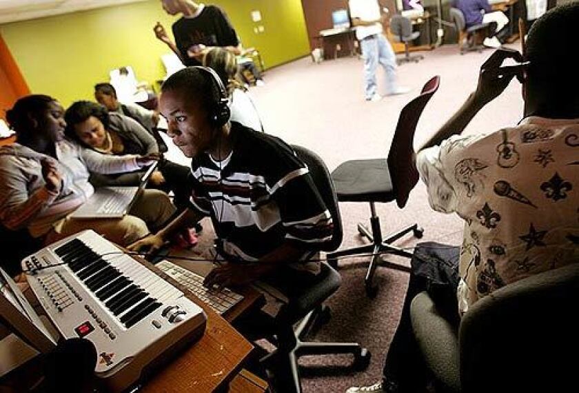 Students work on their music in the studio at Media Arts Academy Centinela in Hawthorne.