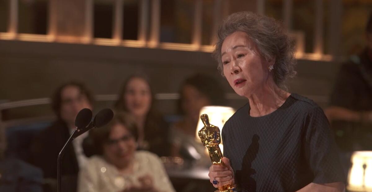 Yuh-Jung Youn, holding her Oscar, gives her acceptance speech.