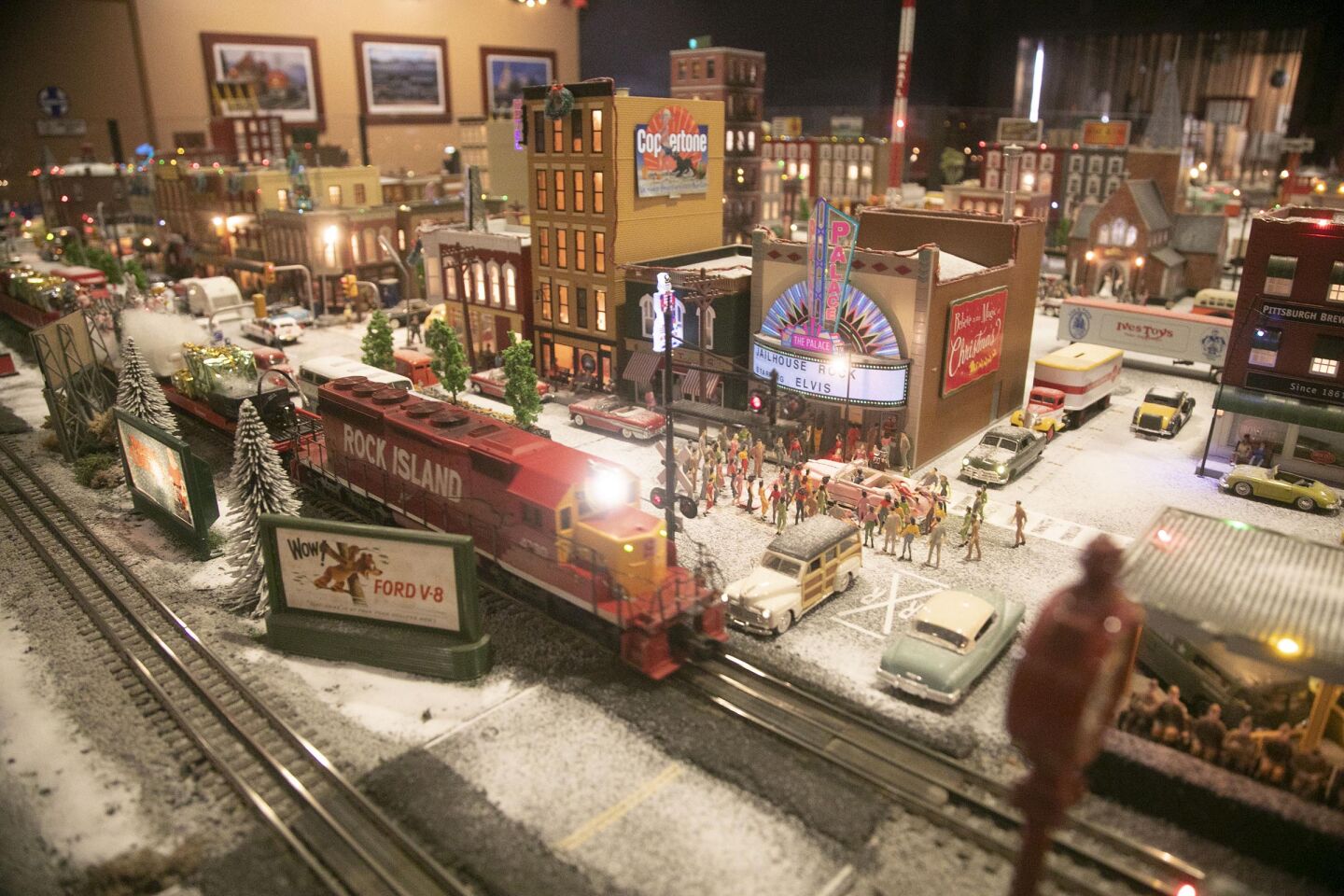 David Lizerbram and his wife Mana Monzavi took over the Old Town Model Railroad Depot, which was in danger of closing. The extensive train layout and its detailed and sometimes humorous dioramas was photographed on Friday, Dec. 13, 2019, at its Old Town, San Diego location. Train going by the Palace Theater with Elvis in his pink Cadillac.