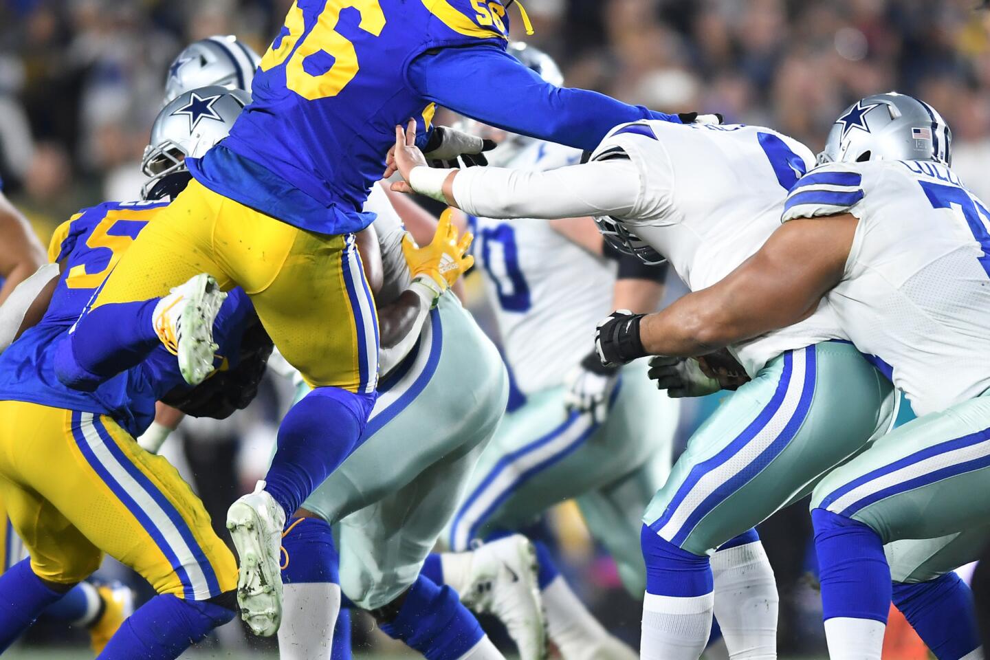 Rams linebacker Dante Fowler sacks Coyboys quarterback Dak Prescott during the second quarter.