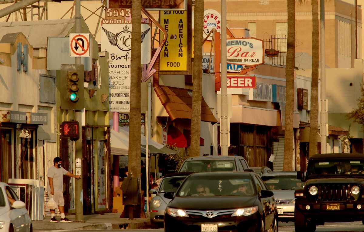 Small shops and restaurants line Whittier Boulevard in East Los Angeles.