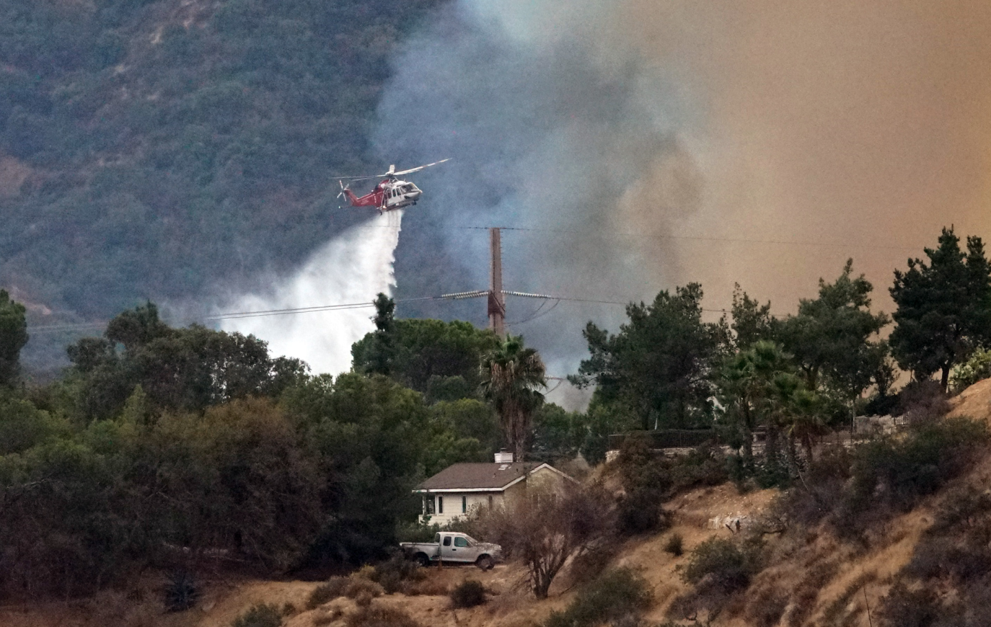 Crews drop water on the La Tuna Canyon Fire.