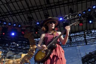 Leslie Feist performs during the Bonnaroo Music and Arts Festival in Manchester, Tenn. (AP Photo/Dave Martin)