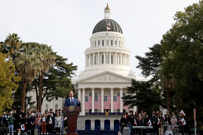 SACRAMENTO, CA - JANUARY 06: Gov. Gavin Newsom gives the inaugural address after taking the oath of office being sworn in by Chief Justice Patricia Guerrero, at his inauguration ceremony at the Capitol Mall on Friday, Jan. 6, 2023 in Sacramento, CA. Gov. Gavin Newsom celebrated the start of his second term Friday on the second anniversary of the attack on the U.S. Capitol. The Inauguration of Governor Gavin Newsom, Fortieth Governor of the State of California. Swearing-in Ceremony and Inaugural Address inauguration. (Gary Coronado / Los Angeles Times)