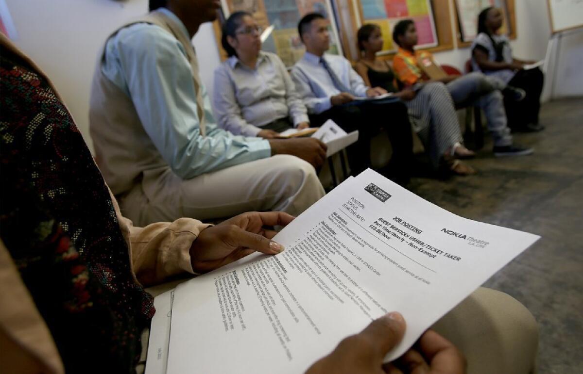 Job seekers prepare to interview for part-time job opportunities at a training center in South Los Angeles.