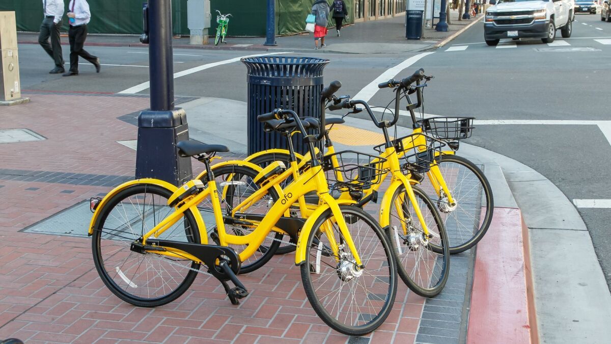 Ofo bikes parked along Broadway in downtown San Diego in March.