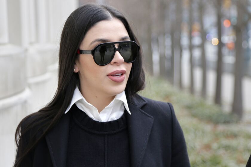 FILE - In this Dec. 6, 2018 file photo, Emma Coronel Aispuro, wife of Joaquin "El Chapo" Guzman, arrives to federal court in New York. Despite her status as the wife of the world’s most notorious drug boss, Coronel Aispuro lived mostly in obscurity -- until her husband went to prison for life. (AP Photo/Seth Wenig, File)