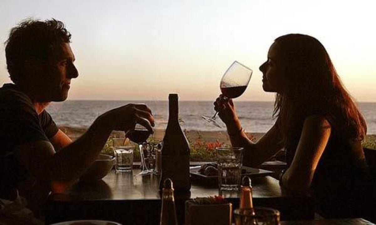 Diners enjoy views of the sea and sand from their table at the Sunset Restaurant in Malibu.