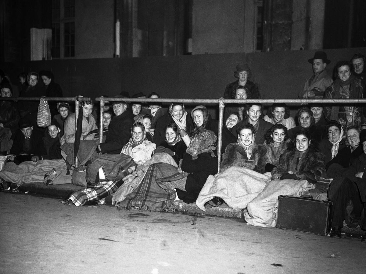 Nov. 19, 1947: People spend the night outside London's Westminster Abbey before the royal wedding.