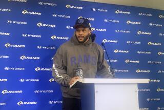 Aaron Donald speaks at a Rams media conference on May 10, 2023.